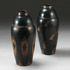 Sotheby´s-Two blackened metal vases