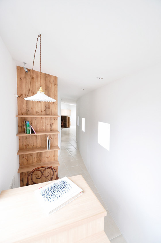Little one-room house with a curve by Studio Velocity | Shops