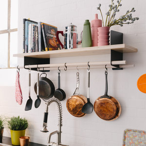 Atelier wall shelves and coat-rack