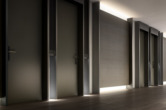 Project | Interior safety door with concealed hinges by Oikos – Architetture d’ingresso