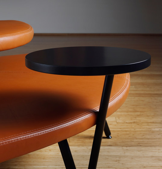 Autobahn, Circular ottoman with floating table by Derlot