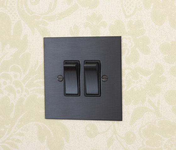 Unlacquered Brass two gang rocker with black insert | Two-way switches | Forbes & Lomax