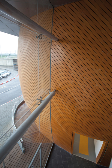 Parklex Facade | Gold ventilated facade system with natural timber veneer | Facade systems | Parklex Prodema