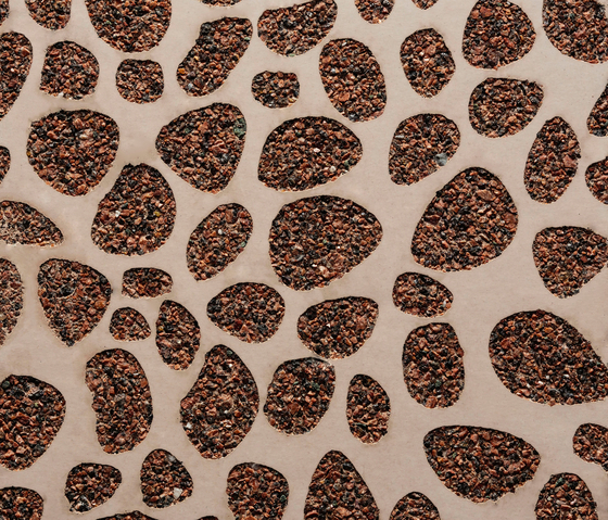 GCNature Pebbles25 nega red cement - red aggregate | Hormigón liso | Graphic Concrete