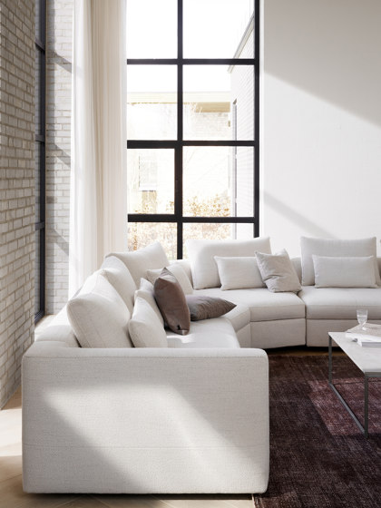 Bergamo corner sofa with lounging unit and pouf wstorage | Sofás | BoConcept