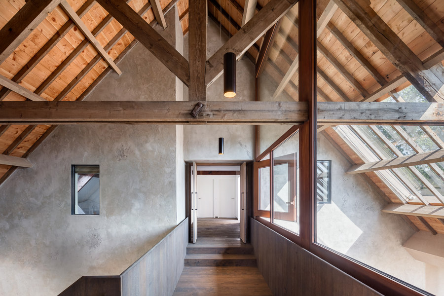 Elegant Pivot Doors in Exclusive Farmhouse by FritsJurgens | Manufacturer references