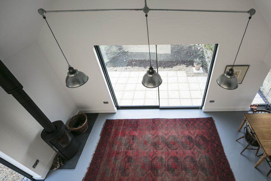 Corrugated metal extension de Eastabrook Architects | Casas Unifamiliares