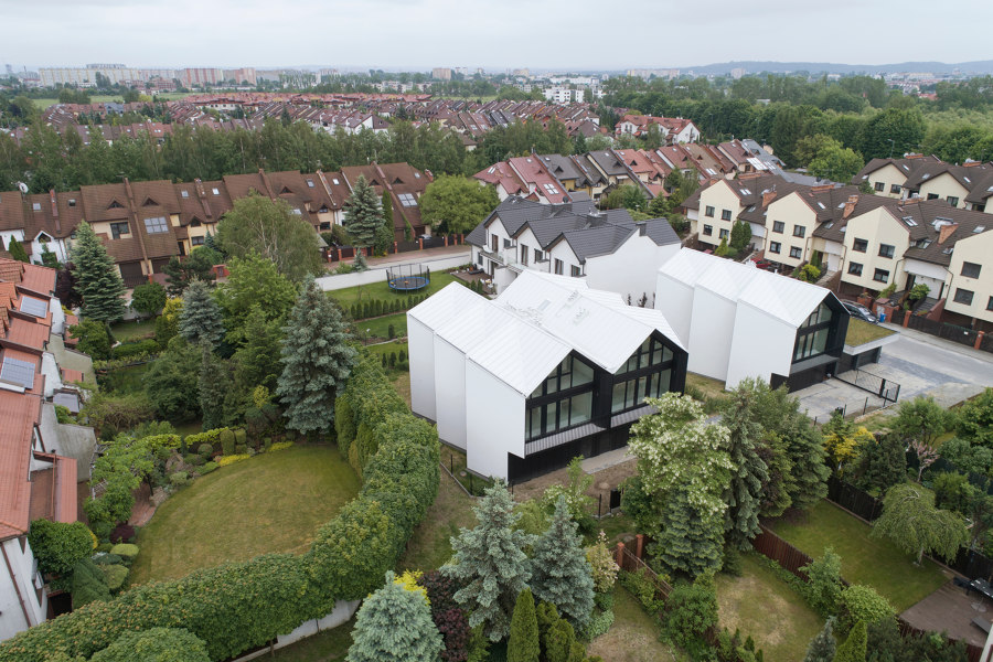 Houses with Gills de Superhelix Pracownia Projektowa | Immeubles