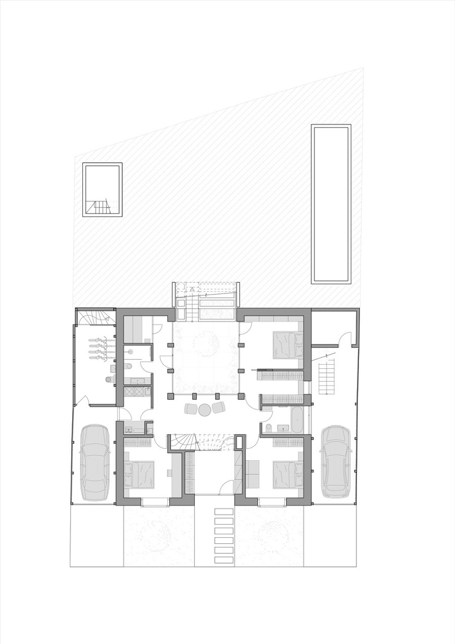 Family House With Atrium di SENAA architekti | Case unifamiliari