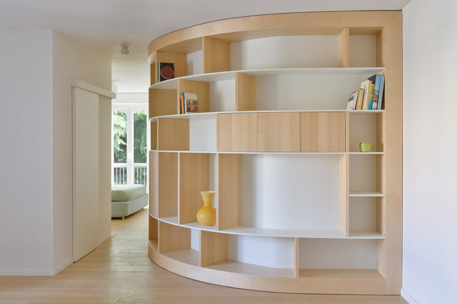 Apartment with a Library by Olbos Studio | Living space