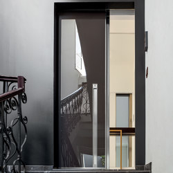 Vela | Porta blindata scorrevole | Porte casa | Oikos – Architetture d’ingresso