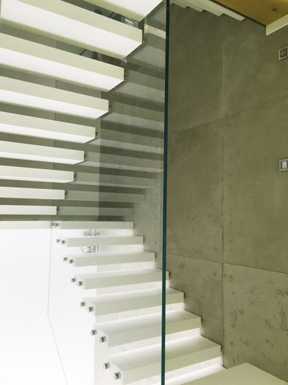 Floating stairs in Corian |  | Siller Treppen