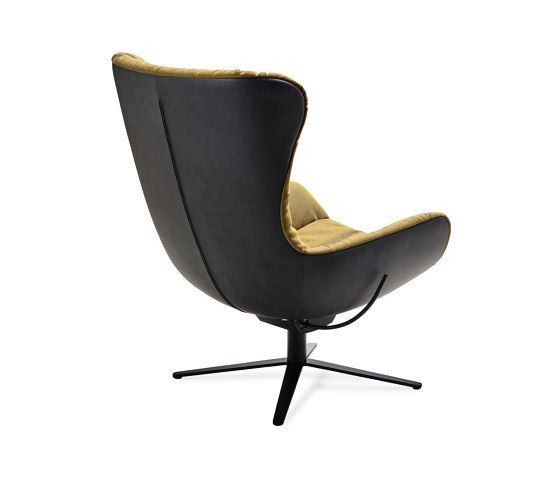 Leya | Wingback Chair with x-base frame with rocker / tilting mechanism & Ottoman by FREIFRAU MANUFAKTUR | Armchairs
