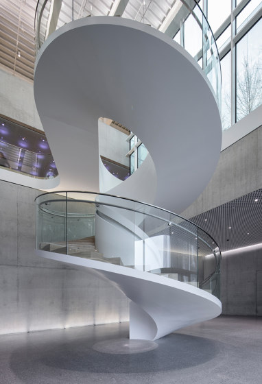 Staircase with elegant glass railings at the Bühler Innovation Campus in Uzwil | Scale | MetallArt Treppen