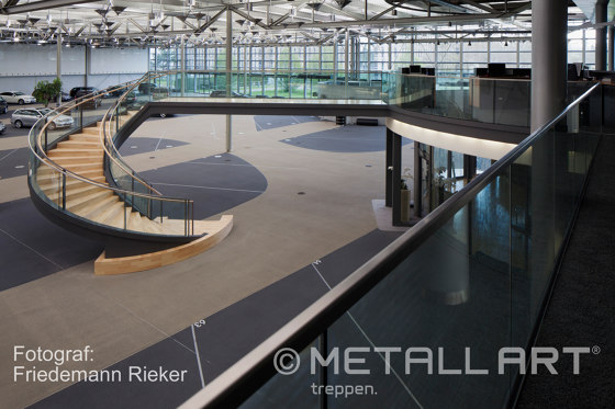 Design stairs featuring glass railings at Daimler in Sindelfingen | Staircase systems | MetallArt Treppen