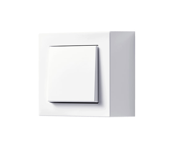 A CUBE switch in white | Interrupteurs à bouton poussoir | JUNG