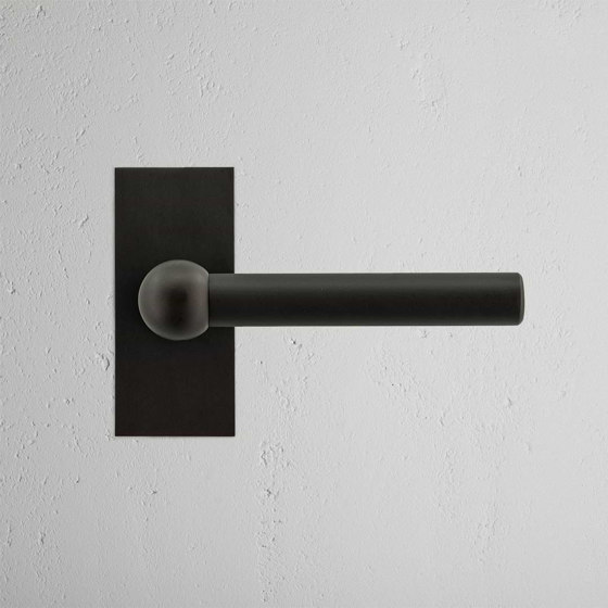 Manilla para puertas Harper con placa corta (con muelle) | Manillas | Corston Architectural Detail