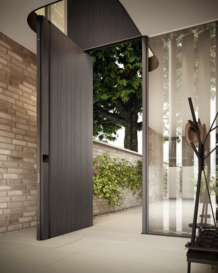 Synua | Puerta blindada con revestimientos de aluminio | Puertas de las casas | Oikos Venezia – Architetture d’ingresso