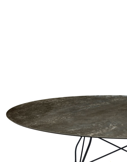 Glossy Marble Oval Aged Bronze Structure: Matt Black Painteed Steel | Dining tables | Kartell