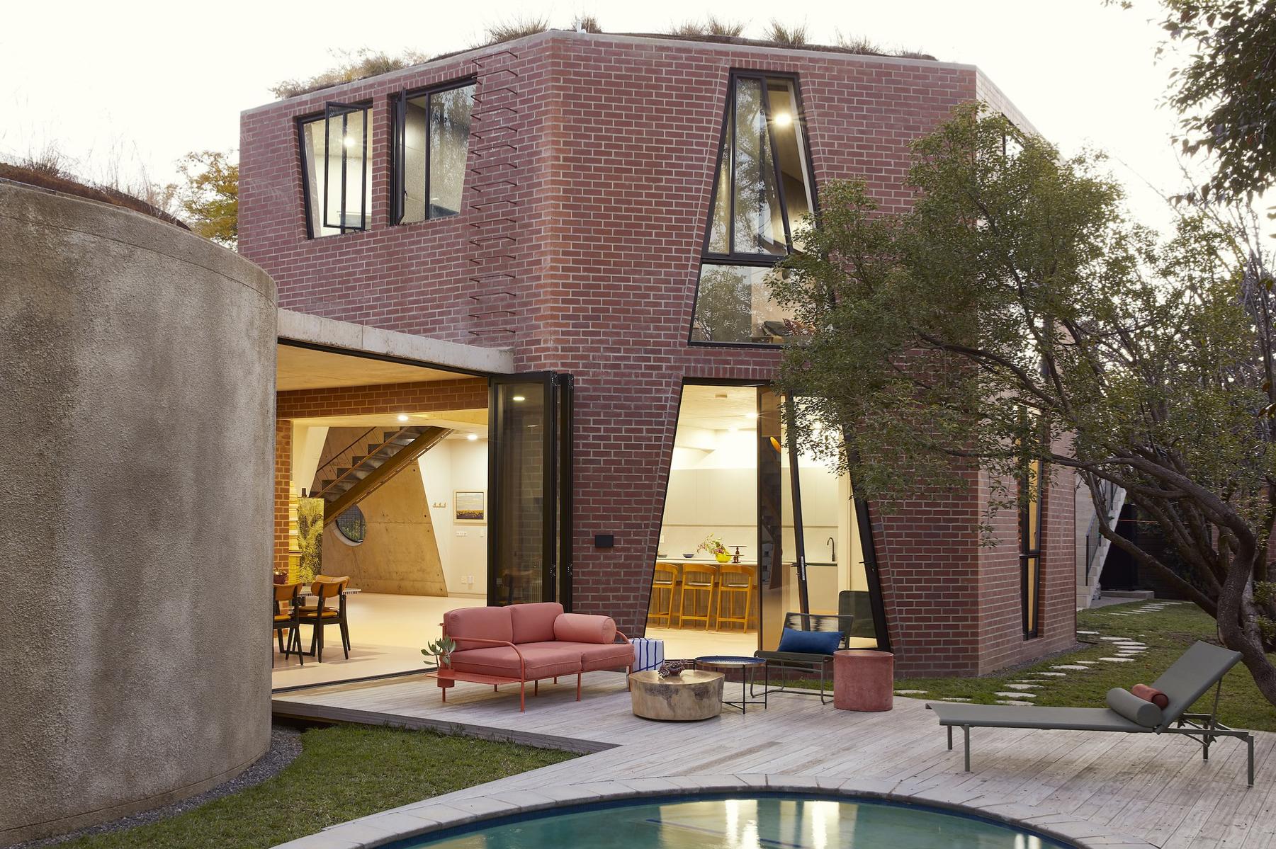 Ten homes with weird and wonderful custom-shaped windows