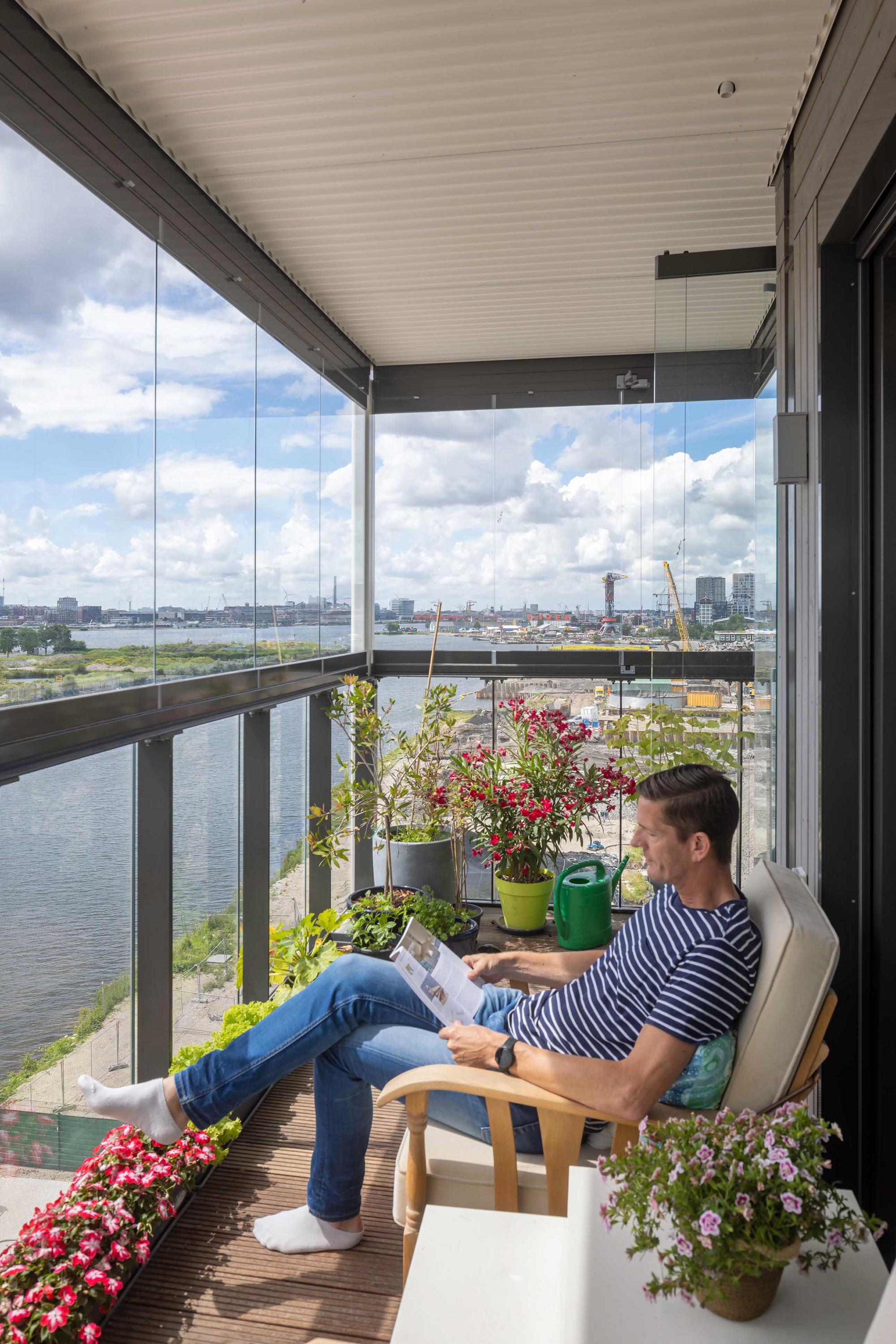 Stories of Amsterdam with balcony glazing from Solarlux